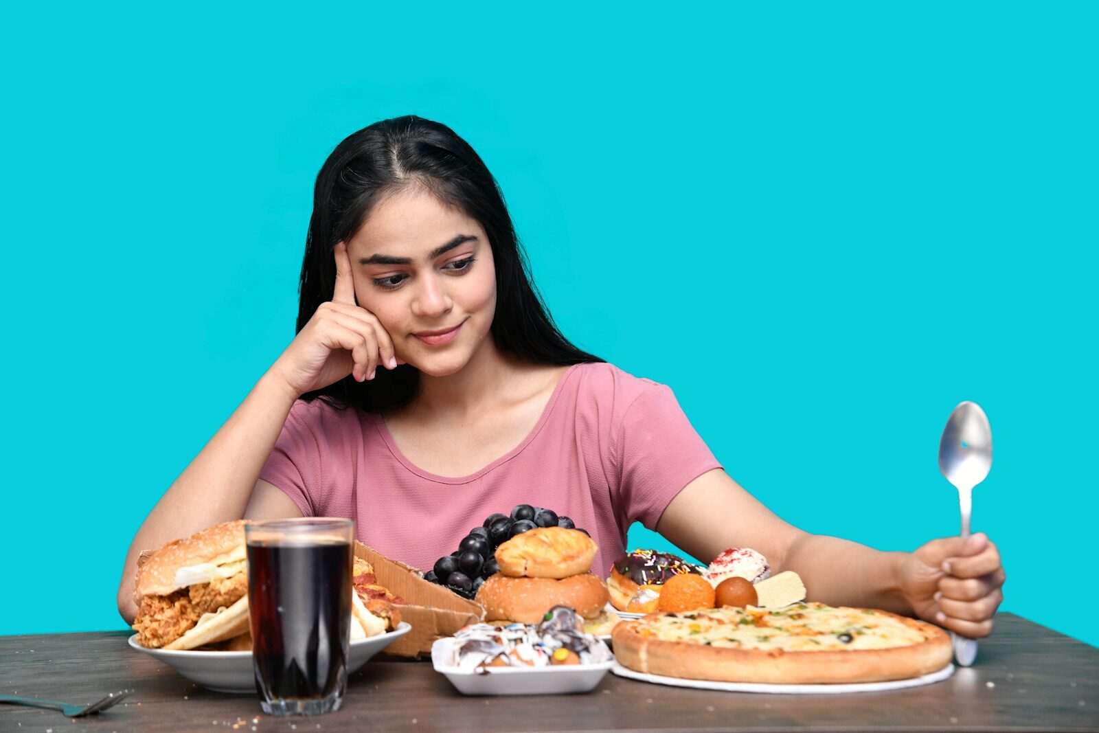 a woman eating a plate of food